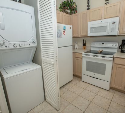 Kitchen w/ Washer & Dryer