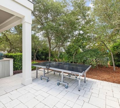 Enjoy a Poolside Game of Ping Pong!