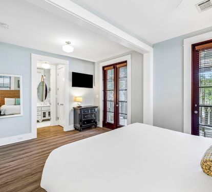 Primary King Suite - Private Balcony + Flat-Screen TV
