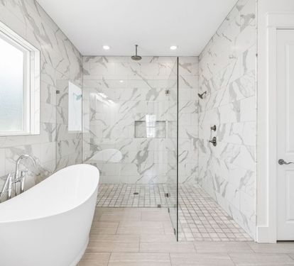 Primary King En-Suite - Expansive Walk-In Shower + Soaking Tub