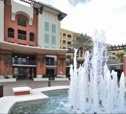 From the fountain to the palm trees, the whole property feels like a warm invitation to slow down and enjoy the coast.
