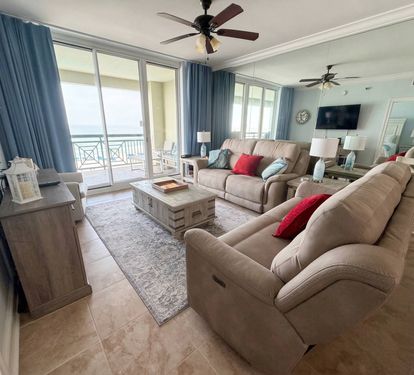 Unwind in a bright, comfortable space where the soundtrack is gentle waves and the backdrop is pure emerald water.