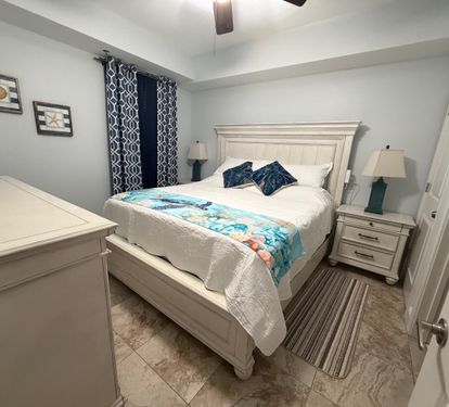 A charming guest bedroom that gives everyone their own comfortable place to recharge. King Bedroom #2