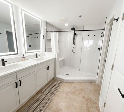 Start your day with plenty of space—double sinks, bright lighting, and a large walk-in tiled shower make mornings easy for everyone. Off the Primary bedroom