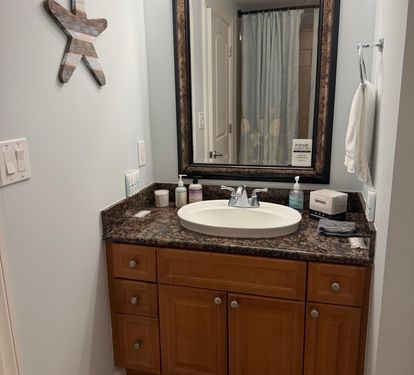 Third full bathroom with granite vanity and tub/shower combo—perfect for keeping everyone comfortable during busy beach mornings. Bathroom #3 is located off the Queen guest bedroom