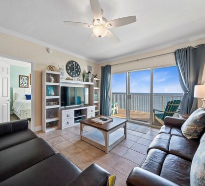 Relax in your oceanfront living room with leather seating and breathtaking sea views from your private balcony.