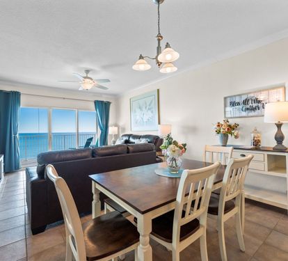 Relax in your bright, airy living space with stunning ocean views and comfortable seating for memorable beachfront dining.