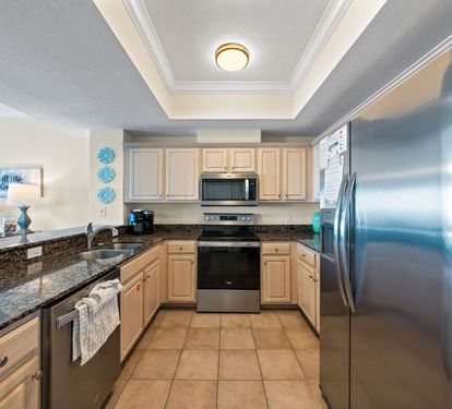 Your fully equipped kitchen features stainless steel appliances, granite countertops, and everything needed for preparing meals during your stay.