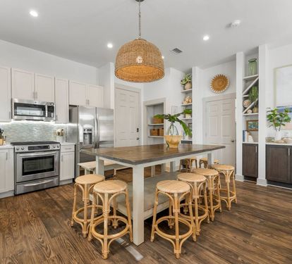 Pendant-lit island seating for big family meals.