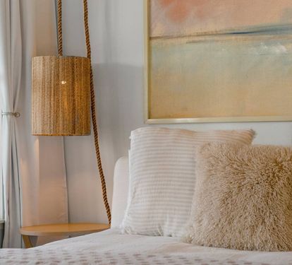 Soft, layered linens make for a dreamy night's sleep