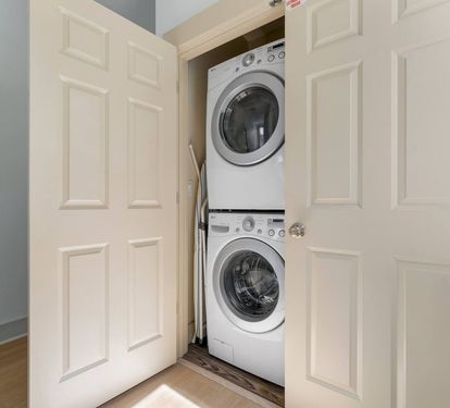 Pack light—full-size washer and dryer right on site.