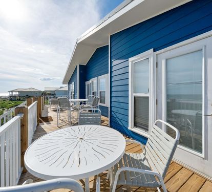 Cabana Beach House Dining on the Gulf Front Deck