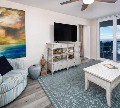 Living room seating with balcony access