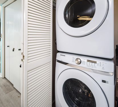 Laundry in hallway closet