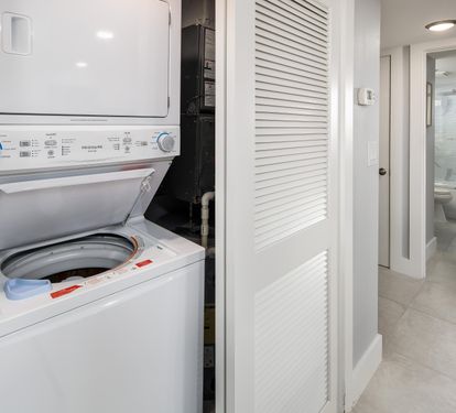 Laundry in hall closet