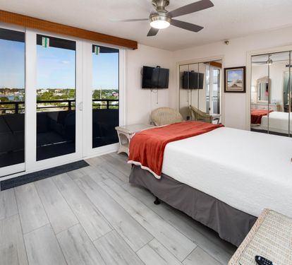 Guest bedroom queen with Juliet balcony and view of intracoastal