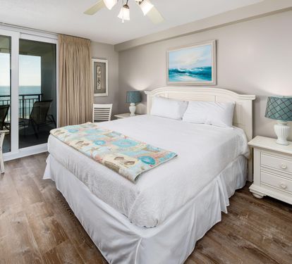 Master bedroom king with balcony access