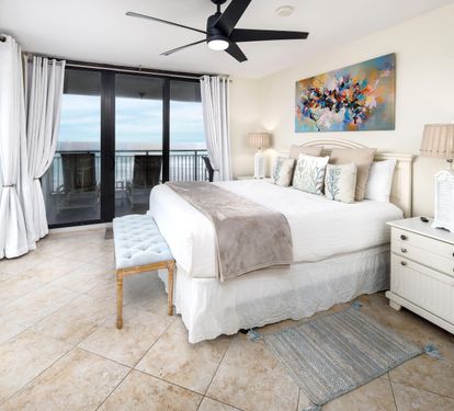 Master bedroom king with balcony access