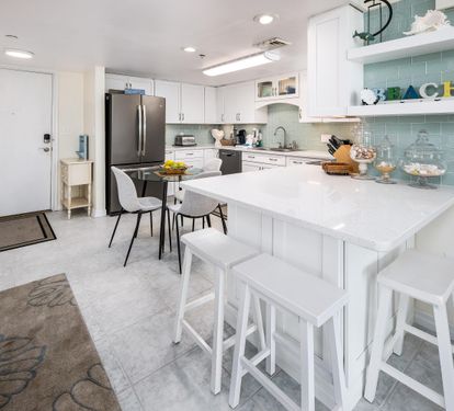 Bar seating/kitchen and entry way