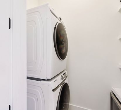 Stack Washer & Dryer + Wine Fridge in the Laundry Room