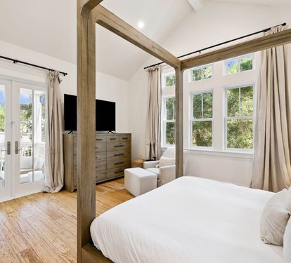 Primary King Suite - Offering a Flat-Screen TV & Access to Porch