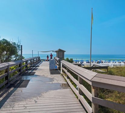 Boardwalk from Tides to the beach.