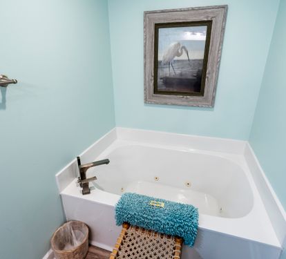 Jetted tub in the updated primary bathroom.