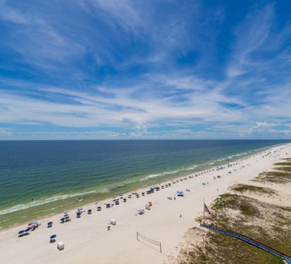 Sweeping westward view of the white-sand beach and Gulf.