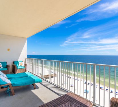 Private beachfront balcony with panoramic Gulf and shoreline views.