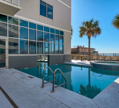 Outdoor pool beside the Seawind building.