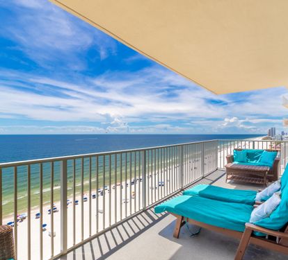 Private balcony with sweeping coastline and Gulf views.