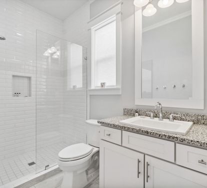 1st Floor Shared Bathroom Equipped with Walk In Shower & Single Vanity