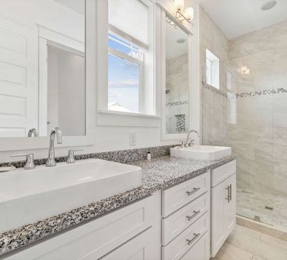 Guest En Suite Equipped with a Dual Vanity & Walk In Shower