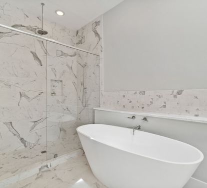 Enjoy the Walk-In Shower or Soaking Tub in the Primary En-Suite