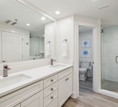 Primary En-Suite - Dual Vanities & Walk-In Shower